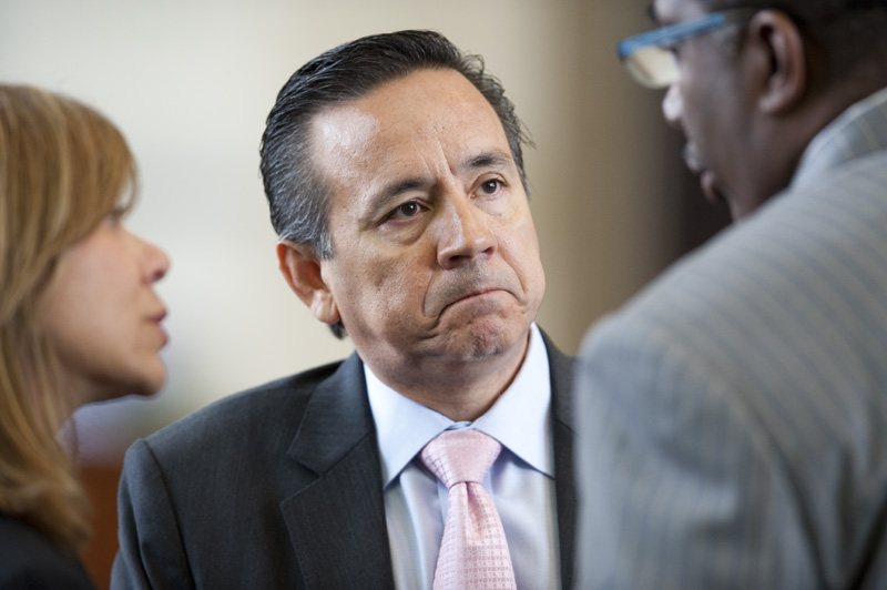 State Sen. Carlos Uresti, D-San Antonio, listens to colleagues on the Senate floor on April 19, 2011.