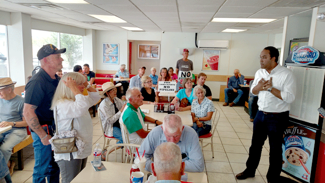 Representative Will Hurd (right), spoke to a group of about 50 citizens in attendance at the Alpine stop in his "DQ 22" tour of his district which covers a large portion of West Texas. Hurd visited 22 Dairy Queens and one coffee shop in the district, trying to reach as many voters as possible in the highly contested race in which the incumbent freshman congressman is competing against West Texas and Alpine native Pete Gallego, who Hurd defeated in 2014. (Rebecca Hagerman, photo)
